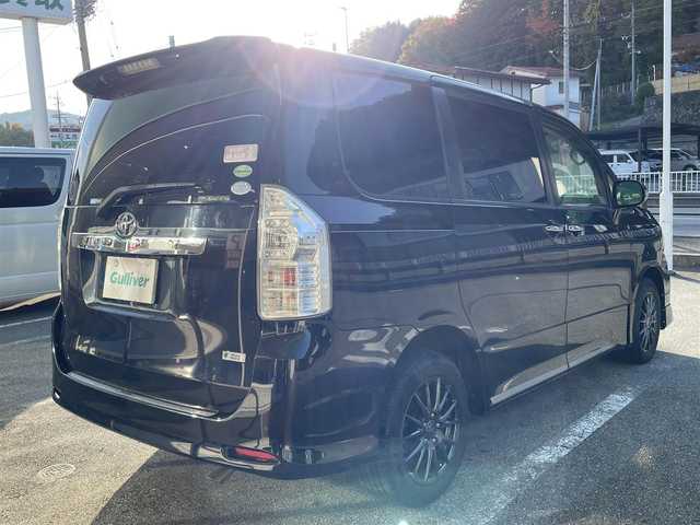 トヨタ ヴォクシー ZS 煌Z 岐阜県 2013(平25)年 7.3万km ブラック 4WD/両側パワースライドドア/モデリスタエアロ/ハーフレザーシート/純正ナビ/【Bluetooth．CD.DVD.AM/FM】/GPS(ASSURA)/ETC/ドライブレコーダー/バックカメラ/ハーフレザーシート/純正フロアマット/センターデフロック/スマートキー/保証書/取扱説明書/スペアキー