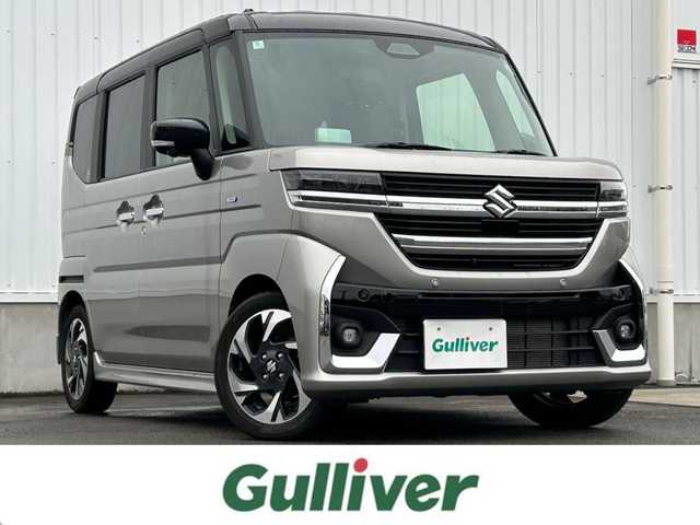 スズキ スペーシア カスタム HYBRID XS ターボ 愛媛県 2024(令6)年 2.3万km スチールシルバーメタリック/ブルーイッシュブラックパール 純正9インチHDナビ（Bluetooth/AppleCarPlay/AndroidAuto/フルセグ）/スズキセーフティサポート/全方位モニター/両側パワースライドドア/ステアリングヒーター/シートヒーター/レーダークルーズコントロール/パーキングアシスト/純正15インチアルミホイール/LEDヘッドライト/フォグランプ/レーンキープアシスト/パドルシフト/横滑り防止装置/スマートキー/プッシュスタート/ABS