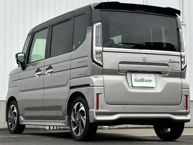 スズキ スペーシア カスタム HYBRID XS ターボ 愛媛県 2024(令6)年 2.3万km スチールシルバーメタリック/ブルーイッシュブラックパール 純正9インチHDナビ（Bluetooth/AppleCarPlay/AndroidAuto/フルセグ）/スズキセーフティサポート/全方位モニター/両側パワースライドドア/ステアリングヒーター/シートヒーター/レーダークルーズコントロール/パーキングアシスト/純正15インチアルミホイール/LEDヘッドライト/フォグランプ/レーンキープアシスト/パドルシフト/横滑り防止装置/スマートキー/プッシュスタート/ABS