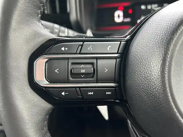 スズキ スペーシア カスタム HYBRID XS ターボ 愛媛県 2024(令6)年 2.3万km スチールシルバーメタリック/ブルーイッシュブラックパール 純正9インチHDナビ（Bluetooth/AppleCarPlay/AndroidAuto/フルセグ）/スズキセーフティサポート/全方位モニター/両側パワースライドドア/ステアリングヒーター/シートヒーター/レーダークルーズコントロール/パーキングアシスト/純正15インチアルミホイール/LEDヘッドライト/フォグランプ/レーンキープアシスト/パドルシフト/横滑り防止装置/スマートキー/プッシュスタート/ABS