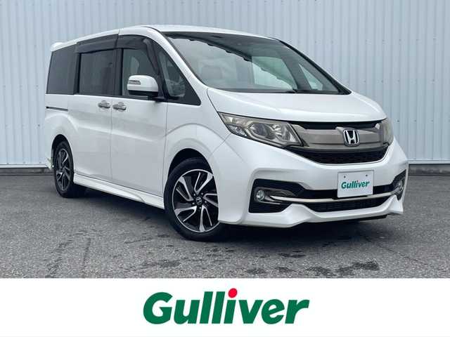 ホンダ ステップワゴン スパーダ クールスピリット 滋賀県 2015(平27)年 9.5万km ホワイトオーキッドパール 純正SDナビ/・フルセグTV/・Bluetooth/・CD/・DVD/・バックカメラ/後席モニター/前後ドラレコ/ETC/ハーフレザー/シートヒーター/革巻きステアリング/パドルシフト/ホンダセンシング/アダプティブ・クルーズ・コントロール/横滑り防止装置/車線維持支援システム/衝突軽減ブレーキ/誤発進抑制機能/歩行者事故低減ステアリング/路外逸脱抑制機能/先行車発進お知らせ機能/標識認識機能/盗難防止装置/アイドリングストップ/LEDヘッドライト/オートライトコントロール/フォグランプ/電格ウィンカーミラー/ドアバイザー/スマートキー/プッシュスタート