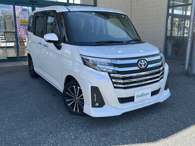 トヨタ ルーミー カスタムG－T 愛知県 2022(令4)年 2.9万km パールホワイトⅢ 登録時走行距離28493km/パラノミックビューモニター/コーナーセンサー/純正9インチディスプレイオーディオ/スマートアシスト/衝突警報機能/誤発進抑制機能(前後)/車線逸脱警報/先行車発進告知/ロードサインアシスト/アダプティブクルーズコントロール/電動パーキング/オートホールド/両側パワスラ/前席シートヒーター/ビルトインETC/USBアクセサリー×2/ステアリングスイッチ/スマートキー/(スペアキー×1)/取説/保証書