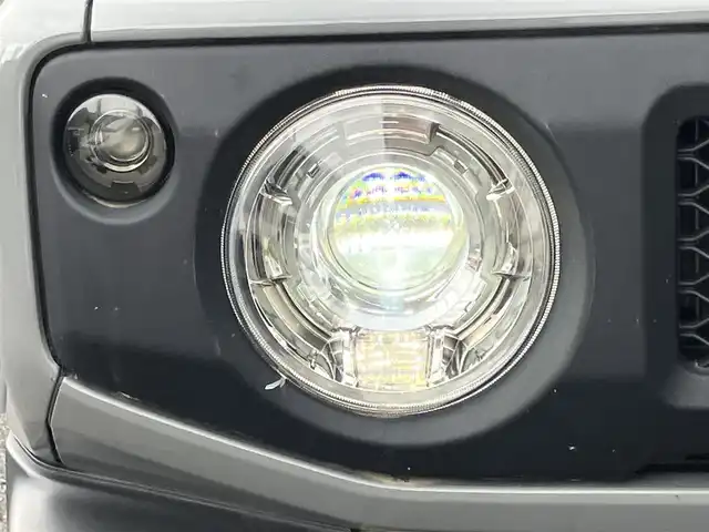 スズキ ジムニー XC 山口県 2022(令4)年 1万km ミディアムグレー 1inリフトアップ(バネ)/社外ディスプレイオーディオ/　＆バックカメラ/社外16インチアルミ/デュアルセンサーブレーキサポート/純正フロアマット/純正フォグランプ/ウィンカーミラー/スマートキー/エンジンプッシュスタート/オートライト/フロントシートヒーター/ETC