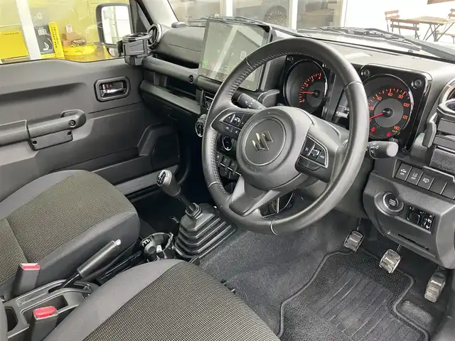 スズキ ジムニー XC 山口県 2022(令4)年 1万km ミディアムグレー 1inリフトアップ(バネ)/社外ディスプレイオーディオ/　＆バックカメラ/社外16インチアルミ/デュアルセンサーブレーキサポート/純正フロアマット/純正フォグランプ/ウィンカーミラー/スマートキー/エンジンプッシュスタート/オートライト/フロントシートヒーター/ETC