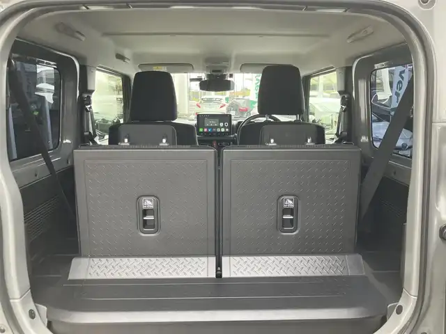 スズキ ジムニー XC 山口県 2022(令4)年 1万km ミディアムグレー 1inリフトアップ(バネ)/社外ディスプレイオーディオ/　＆バックカメラ/社外16インチアルミ/デュアルセンサーブレーキサポート/純正フロアマット/純正フォグランプ/ウィンカーミラー/スマートキー/エンジンプッシュスタート/オートライト/フロントシートヒーター/ETC