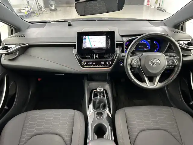 トヨタ カローラ スポーツ G Z 愛知県 2019(平31)年 7.9万km アティチュードブラックマイカ 禁煙車/6速MT/ワンオーナー/7インチナビ/（CD/DVD/Bluetooth/フルセグTV/USB)/バックカメラ/トヨタセーフティセンス/・プリクラッシュセーフティ/・レーダークルーズコントロール/・レーンディパーチャーアラート/・オートマチックハイビーム/・誤発進抑制機能/・ふらつき警報/ドライブレコーダー/ETC/純正18インチアルミホイール/LEDヘッドライト/フロントフォグランプ/オートライト/スマートキー/スペアキー有/プッシュスタート/横滑り防止装置/純正フロアマット