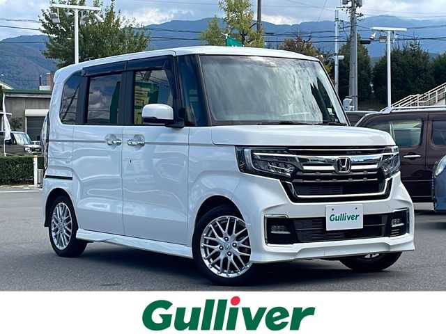 ホンダ Ｎ ＢＯＸ カスタム L ターボ 長野県 2022(令4)年 4万km プラチナホワイトパール 純正８インチSDナビ/BluetoothAudio/DVD再生可能/ビルトインETC/フルセグTV/バックカメラ/両側パワースライドドア/ハーフレザーシート/前席シートヒーター/革巻きステアリング/ステアリングスイッチ/ステアリングスイッチ/パドルシフト/ＭＴモード付ＡＴ/LEDヘッドランプ/フォグランプ/オートライト/スマートキー＆プッシュスタート/電動格納ミラー/純正15インチAW/純正フロアマット/W＋サイド＋カーテンエアバッグ/ＵＳＢ入力端子/ホンダセンシング/衝突軽減ブレーキ/誤発進抑制機能/後方誤発進抑制機能/路外逸脱抑制機能/車線維持支援システム/アダプティブクルーズコントロール/オートハイビーム/先行車発進お知らせ機能/歩行者事故低減ステアリング/標識認識機能/コーナーセンサー