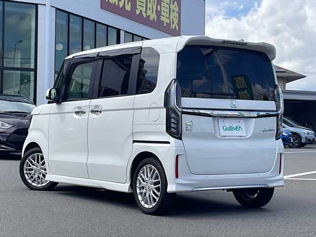 ホンダ Ｎ ＢＯＸ カスタム L ターボ 長野県 2022(令4)年 4万km プラチナホワイトパール 純正８インチSDナビ/BluetoothAudio/DVD再生可能/ビルトインETC/フルセグTV/バックカメラ/両側パワースライドドア/ハーフレザーシート/前席シートヒーター/革巻きステアリング/ステアリングスイッチ/ステアリングスイッチ/パドルシフト/ＭＴモード付ＡＴ/LEDヘッドランプ/フォグランプ/オートライト/スマートキー＆プッシュスタート/電動格納ミラー/純正15インチAW/純正フロアマット/W＋サイド＋カーテンエアバッグ/ＵＳＢ入力端子/ホンダセンシング/衝突軽減ブレーキ/誤発進抑制機能/後方誤発進抑制機能/路外逸脱抑制機能/車線維持支援システム/アダプティブクルーズコントロール/オートハイビーム/先行車発進お知らせ機能/歩行者事故低減ステアリング/標識認識機能/コーナーセンサー
