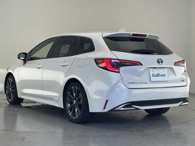 トヨタ カローラツーリング ハイブリッド ダブルバイビー 愛知県 2023(令5)年 1.7万km プラチナホワイトパールマイカ 純９型ＤＡナビ　フルセグＴＶ　バックカメラ　ＡＣ１００Ｖ　ＥＴＣ２．０　ワイヤレス充電　ＢＳＭ　前後ドラレコ　セーフティセンス　衝突軽減　シートヒーター　スペアタイヤ　ｎａｎｏｅＸ　追従クルコン　禁煙　LEDヘッドライト　オートハイビーム　USBポート　電子パーキング　ブレーキホールド　Bluetooth　前後ドラレコ