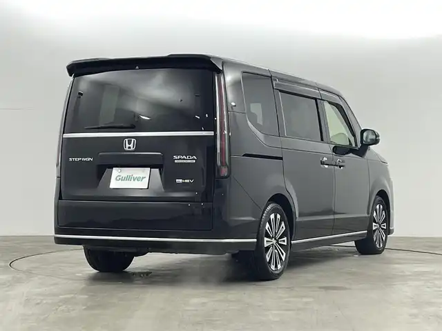 ホンダ ステップワゴン スパーダ eHEV プレミアムライン 福島県 2022(令4)年 5.2万km クリスタルブラックパール ホンダセンシング/・衝突軽減ブレーキ（CMBS）/・誤発進抑制機能/・後方誤発進抑制機能/・近距離衝突軽減ブレーキ/・歩行者事故低減ステアリング/・路外逸脱抑制機能/・アダプティブクルーズコントロール（ACC）/・車線維持支援システム（LKAS）/・トラフィックジャムアシスト(渋滞運転支援機能）/・先行車発進お知らせ機能/・標識認識機能/・アダプティブドライビングビーム/・パーキングセンサーシステム/・後退出庫サポート/・急アクセル抑制機能/純正11.4インチナビ/・フルセグ/CD/DVD/USB/BT/FM/AM/・マルチビューカメラシステム/・ETC/前後ドライブレコーダー/両側パワースライドドア/電動リアゲート/革巻きステアリング/・パドルシフト/・ステアリングスイッチ/ハーフレザーシート/・前席シートヒーター/オットマン/ＬＥＤヘッドライト/・フォグランプ/・オートライト/電動パーキングブレーキ/・オートブレーキホールド/電動格納ミラー/・ウィンカーミラー/スマートキー/・プッシュスタート/純正ラバーマット/ドアバイザー/純正17インチＡＷ