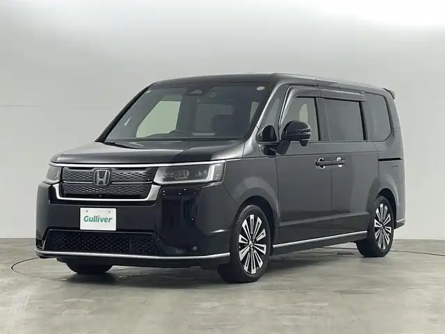 ホンダ ステップワゴン スパーダ eHEV プレミアムライン 福島県 2022(令4)年 5.2万km クリスタルブラックパール ホンダセンシング/・衝突軽減ブレーキ（CMBS）/・誤発進抑制機能/・後方誤発進抑制機能/・近距離衝突軽減ブレーキ/・歩行者事故低減ステアリング/・路外逸脱抑制機能/・アダプティブクルーズコントロール（ACC）/・車線維持支援システム（LKAS）/・トラフィックジャムアシスト(渋滞運転支援機能）/・先行車発進お知らせ機能/・標識認識機能/・アダプティブドライビングビーム/・パーキングセンサーシステム/・後退出庫サポート/・急アクセル抑制機能/純正11.4インチナビ/・フルセグ/CD/DVD/USB/BT/FM/AM/・マルチビューカメラシステム/・ETC/前後ドライブレコーダー/両側パワースライドドア/電動リアゲート/革巻きステアリング/・パドルシフト/・ステアリングスイッチ/ハーフレザーシート/・前席シートヒーター/オットマン/ＬＥＤヘッドライト/・フォグランプ/・オートライト/電動パーキングブレーキ/・オートブレーキホールド/電動格納ミラー/・ウィンカーミラー/スマートキー/・プッシュスタート/純正ラバーマット/ドアバイザー/純正17インチＡＷ