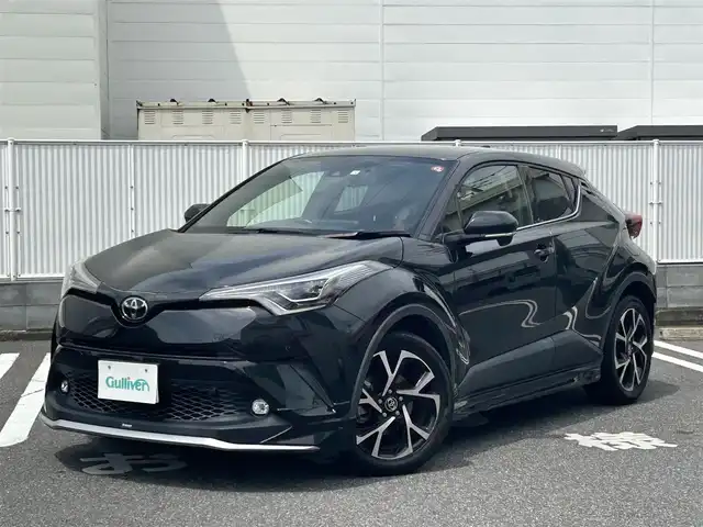 トヨタ Ｃ－ＨＲ G－T 群馬県 2018(平30)年 4.4万km ブラックマイカ 4WD/寒冷地仕様車/純正SDナビ（FM・AM/CD・DVD/Bluetooth）/フルセグTV/バックカメラ/ビルトインETC/純正ドライブレコーダー（前方）/プリクラッシュ/横滑り防止装置/レーンキープアシスト/パーキングセンサー/レーダークルーズコントロール/BSM/レザーシート/シートヒーター（D/N席）/純正フロアマット/オートライト/オートハイビーム/LEDヘッドライト/ガナドール4本だしマフラー/モデリスタフルエアロ/純正18インチアルミホイール/プッシュスタート/スマートキー/取扱説明書/保証書/記録簿
