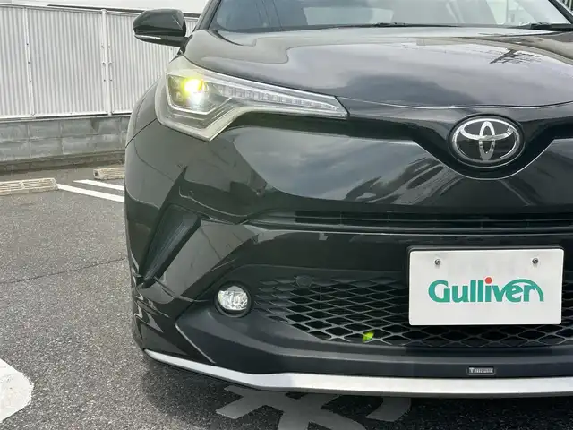 トヨタ Ｃ－ＨＲ G－T 群馬県 2018(平30)年 4.4万km ブラックマイカ 4WD/寒冷地仕様車/純正SDナビ（FM・AM/CD・DVD/Bluetooth）/フルセグTV/バックカメラ/ビルトインETC/純正ドライブレコーダー（前方）/プリクラッシュ/横滑り防止装置/レーンキープアシスト/パーキングセンサー/レーダークルーズコントロール/BSM/レザーシート/シートヒーター（D/N席）/純正フロアマット/オートライト/オートハイビーム/LEDヘッドライト/ガナドール4本だしマフラー/モデリスタフルエアロ/純正18インチアルミホイール/プッシュスタート/スマートキー/取扱説明書/保証書/記録簿
