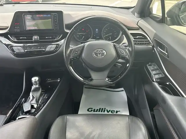 トヨタ Ｃ－ＨＲ G－T 群馬県 2018(平30)年 4.4万km ブラックマイカ 4WD/寒冷地仕様車/純正SDナビ（FM・AM/CD・DVD/Bluetooth）/フルセグTV/バックカメラ/ビルトインETC/純正ドライブレコーダー（前方）/プリクラッシュ/横滑り防止装置/レーンキープアシスト/パーキングセンサー/レーダークルーズコントロール/BSM/レザーシート/シートヒーター（D/N席）/純正フロアマット/オートライト/オートハイビーム/LEDヘッドライト/ガナドール4本だしマフラー/モデリスタフルエアロ/純正18インチアルミホイール/プッシュスタート/スマートキー/取扱説明書/保証書/記録簿