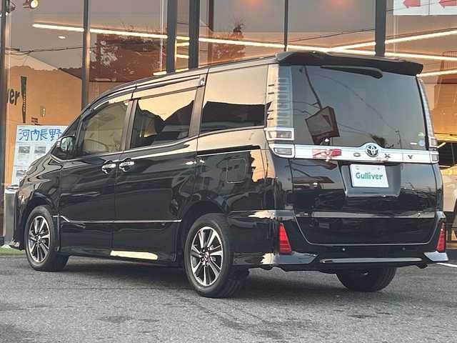 トヨタ ヴォクシー ZS 煌Ⅱ 大阪府 2020(令2)年 8.9万km ブラック 1オーナー　プリクラッシュセーフティ　１１型アルパインナビ　アルパインフリップダウンモニター　バックカメラ　両側パワースライドドア　前後ドラレコ　クリアランスソナー　床下ラゲッジＢＯＸ　シートバックテーブル　CD DVD BT ＨＤＭＩ　SD 　USB フルセグTV　後席シェード　ウィンカーミラー　LEDオートライト　フォグ　ETC　アイドリングストップ