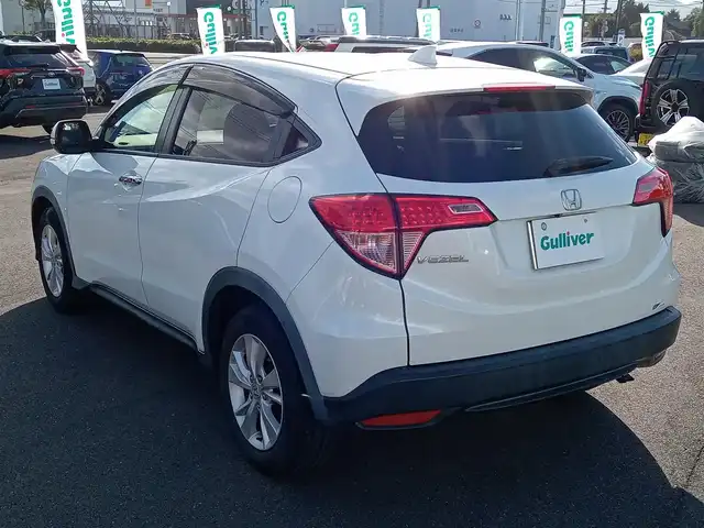 ホンダ ヴェゼル X 福井県 2015(平27)年 13.1万km ホワイトオーキッドパール 社外ナビ/フルセグテレビ/バックカメラ/クルーズコントロール/衝突被害軽減システム/アイドリングストップ/パーキングアシスト/横滑り防止装置/レーンキープアシスト/盗難防止装置/ETC/前後ドライブレコーダー/エンジンスタートボタン/LEDヘッドライト/オートライト/純正16インチAW/スマートキー