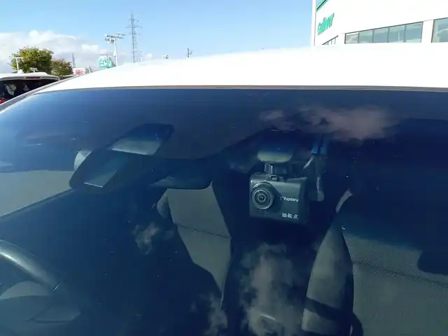 ホンダ ヴェゼル X 福井県 2015(平27)年 13.1万km ホワイトオーキッドパール 社外ナビ/フルセグテレビ/バックカメラ/クルーズコントロール/衝突被害軽減システム/アイドリングストップ/パーキングアシスト/横滑り防止装置/レーンキープアシスト/盗難防止装置/ETC/前後ドライブレコーダー/エンジンスタートボタン/LEDヘッドライト/オートライト/純正16インチAW/スマートキー