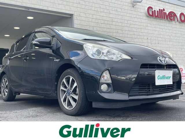 トヨタ アクア G 長野県 2014(平26)年 19.4万km ブラック ・社外7インチメモリーナビゲーション/CD DVD フルセグTV Bluetooth/・バックカメラ/・ETC/・モデリスタAW/・電動格納ミラー/・スマートキー/・エンジンプッシュスタート/・フロアマット