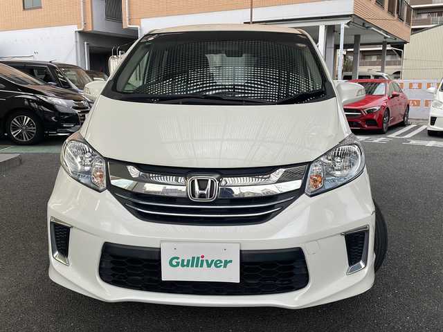 ホンダ フリード ハイブリット プレミアムエディション 大阪府 2016(平28)年 1.9万km ホワイトオーキッドパール ワンオーナー/純正メモリーナビ/フルセグTV/Bluetooth/DVD/純正フリップダウンモニター/バックカメラ/両側パワースライドドア/スマートキー/純正キセノンライト/ビルトインETC