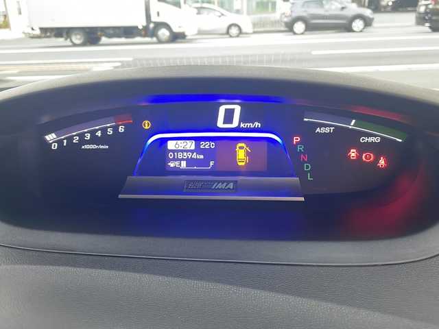 ホンダ フリード ハイブリット プレミアムエディション 大阪府 2016(平28)年 1.9万km ホワイトオーキッドパール ワンオーナー/純正メモリーナビ/フルセグTV/Bluetooth/DVD/純正フリップダウンモニター/バックカメラ/両側パワースライドドア/スマートキー/純正キセノンライト/ビルトインETC