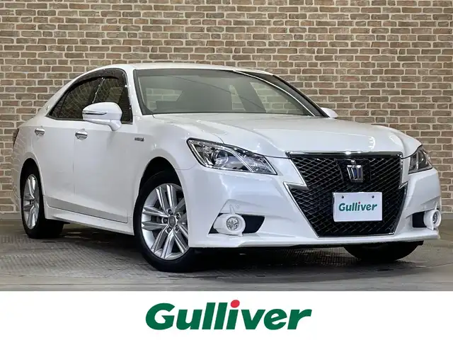 トヨタ クラウン ハイブリッド アスリートS Four 岩手県 2015(平27)年 5.8万km ホワイトパールクリスタルシャイン ４WD/寒冷地仕様/レーダークルーズコントロール/プリクラッシュセーフティ/クリアランスソナー/横滑り防止装置/MTモード付AT/ウインドシールドデアイサー/ヒーテッドドアミラー/パワーシート・シートヒーター(前席)/ステアリングヒーター/純正HDDナビ/フルセグTV/ステアリングスイッチ/バックカメラ/ETC/オートライト/HIDヘッドランプ/フォグランプ/純正１７インチアルミホイール