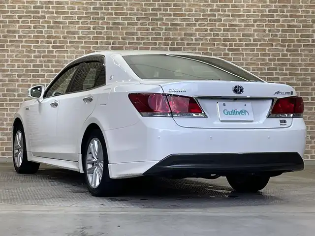 トヨタ クラウン ハイブリッド アスリートS Four 岩手県 2015(平27)年 5.8万km ホワイトパールクリスタルシャイン ４WD/寒冷地仕様/レーダークルーズコントロール/プリクラッシュセーフティ/クリアランスソナー/横滑り防止装置/MTモード付AT/ウインドシールドデアイサー/ヒーテッドドアミラー/パワーシート・シートヒーター(前席)/ステアリングヒーター/純正HDDナビ/フルセグTV/ステアリングスイッチ/バックカメラ/ETC/オートライト/HIDヘッドランプ/フォグランプ/純正１７インチアルミホイール