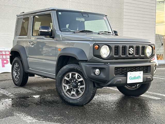 スズキ ジムニー シエラ JC 秋田県 2023(令5)年 0.7万km ミディアムグレー ワンオーナー/純正15インチAW/４WD/スペアキー/取説、保証書/シートヒーター