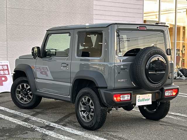 スズキ ジムニー シエラ JC 秋田県 2023(令5)年 0.7万km ミディアムグレー ワンオーナー/純正15インチAW/４WD/スペアキー/取説、保証書/シートヒーター