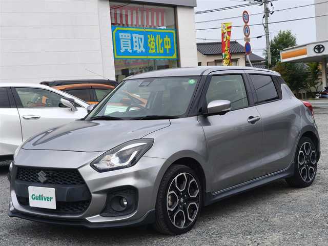 スズキ スイフト スポーツ セーフティPKG 熊本県 2019(令1)年 3.3万km プレミアムシルバーメタリック ワンオーナー/純正8インチナビ（CN-RZ843)/【フルセグTV/CD/DVD/BT】/全周囲カメラ/衝突軽減防止装置/アダプティブクルーズコントロール/レーンキープアシスト/パドルシフト/オートLEDライト/オートハイビーム/ウィンカーミラー/D席シートヒーター/純正17インチAW/プッシュスタート/スマートキー/純正フロアマット/横滑り防止装置/ABS/保証書/取扱説明書/スペアキー