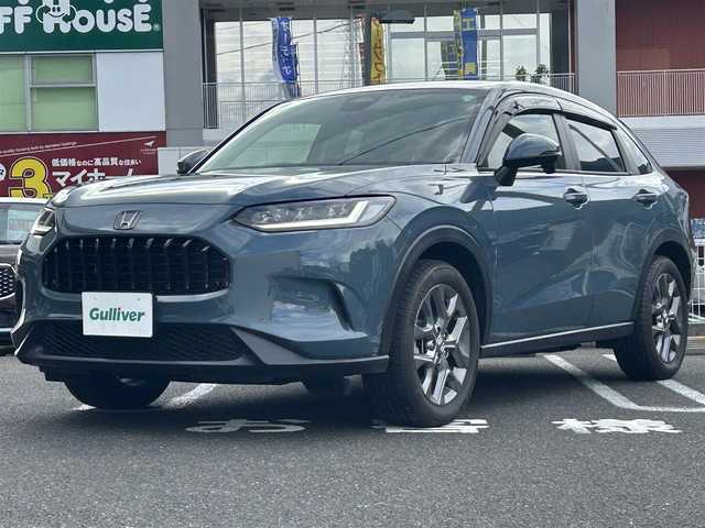 ホンダ ＺＲ－Ｖ ハイブリッド e:HEV X 長崎県 2022(令4)年 0.8万km ブルーグリーン 車体色：G553P：ノルディックフォレスト・パール/純正Gathersナビ(FM/AM/BT/フルセグ/CD/DVD)/プッシュスタート/スマートキー/取扱説明書/保証書/記録簿/パドルシフト/革巻きステアリング/ステアリングリモコン/渋滞追従機能付アダプティブクルーズコントロール(ACC)/車線維持支援システム(LKAS)/ビークルスタビリティアシスト(VSA)/ヒルディセントコントロール/衝突軽減ブレーキ(CMBS)/オートライト/ヘッドライトレベリングダイヤル/ABS/ETC/前後ドラレコ/純正フロアマット/純正18インチアルミホイール/パワーテールゲート/ISOFIX/SRSダブル・サイドエアバッグ/SRSカーテンエアバッグ