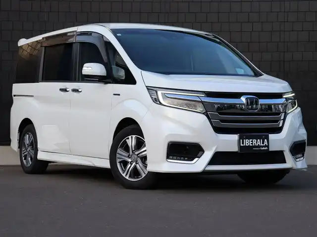 ホンダ ステップワゴン スパーダ ハイブリッド G EX ホンダセンシング 宮城県 2018(平30)年 6.4万km プラチナホワイトパール 純正インターナビ【ＢＴ／ＣＤ／ＤＶＤ／フルセグＴＶ／ＳＤ】/ワンオーナー　/ホンダセンシング　/衝突軽減ブレーキシステム/レーンキープアシスト/両側パワースライドドア　/アダプティブクルーズコントロール　/シートヒーター(DN席)/バックカメラ　/ハーフレザーシート　/ドライブレコーダー/純正フロアマット/ドアバイザー/電動格納ミラー/プッシュスタート/エンジンスターター/スマートキー/LEDヘッドライト/純正16インチAW/禁煙車