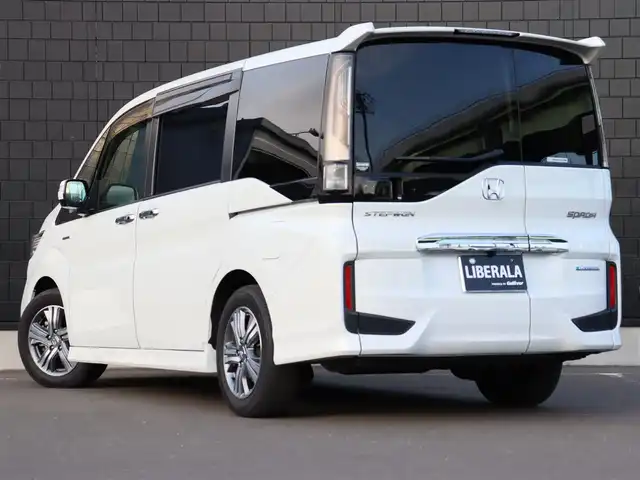 ホンダ ステップワゴン スパーダ ハイブリッド G EX ホンダセンシング 宮城県 2018(平30)年 6.4万km プラチナホワイトパール 純正インターナビ【ＢＴ／ＣＤ／ＤＶＤ／フルセグＴＶ／ＳＤ】/ワンオーナー　/ホンダセンシング　/衝突軽減ブレーキシステム/レーンキープアシスト/両側パワースライドドア　/アダプティブクルーズコントロール　/シートヒーター(DN席)/バックカメラ　/ハーフレザーシート　/ドライブレコーダー/純正フロアマット/ドアバイザー/電動格納ミラー/プッシュスタート/エンジンスターター/スマートキー/LEDヘッドライト/純正16インチAW/禁煙車