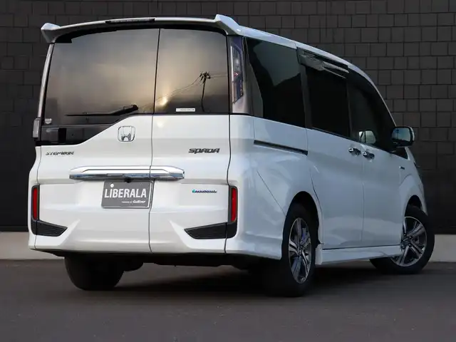 ホンダ ステップワゴン スパーダ ハイブリッド G EX ホンダセンシング 宮城県 2018(平30)年 6.4万km プラチナホワイトパール 純正インターナビ【ＢＴ／ＣＤ／ＤＶＤ／フルセグＴＶ／ＳＤ】/ワンオーナー　/ホンダセンシング　/衝突軽減ブレーキシステム/レーンキープアシスト/両側パワースライドドア　/アダプティブクルーズコントロール　/シートヒーター(DN席)/バックカメラ　/ハーフレザーシート　/ドライブレコーダー/純正フロアマット/ドアバイザー/電動格納ミラー/プッシュスタート/エンジンスターター/スマートキー/LEDヘッドライト/純正16インチAW/禁煙車