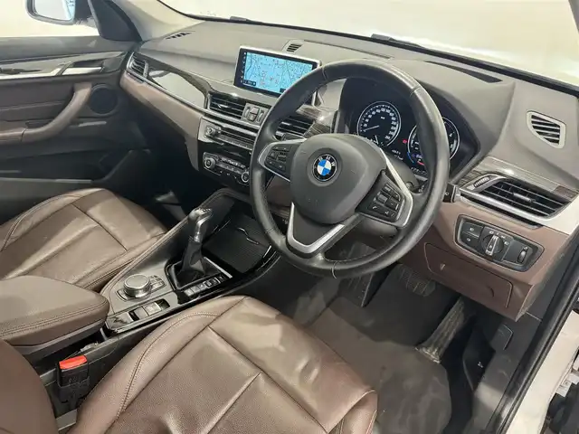 ＢＭＷ Ｘ１ xDrive 18d xライン 熊本県 2018(平30)年 5.8万km 白 純正HDDナビ（CD/Bluetooth、社外地デジ）/バックカメラ/ACC/茶革シート/パワーシート/シートヒーター/パワーバックドア/コーナーセンサー/純正18インチアルミホイール/LEDヘッドライト/ミラー一体型ETC