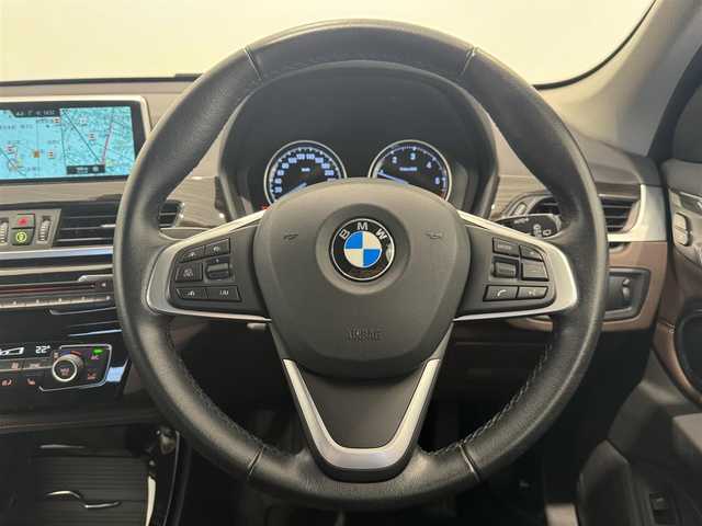 ＢＭＷ Ｘ１ xDrive 18d xライン 熊本県 2018(平30)年 5.8万km 白 純正HDDナビ（CD/Bluetooth、社外地デジ）/バックカメラ/ACC/茶革シート/パワーシート/シートヒーター/パワーバックドア/コーナーセンサー/純正18インチアルミホイール/LEDヘッドライト/ミラー一体型ETC