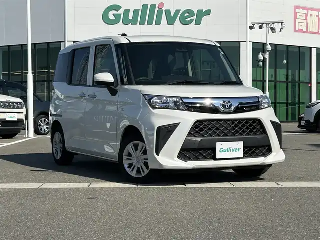 トヨタ ルーミー X 佐賀県 2022(令4)年 3.9万km パールホワイトⅢ 純正７インチＳＤナビ/・AUX/Bluetooth/AM/FM/バックカメラ/ビルトインＥＴＣ/左後パワースライドドア/後席用サイドサンシェード/純正ハロゲンヘッドライト/純正アルミホイール/純正フロアマット/取り扱い説明書/トヨタセーフティセンス/・衝突軽減被害ブレーキ/・盗難防止装置/・オートライト/・コーナーセンサー/・横滑り防止機能