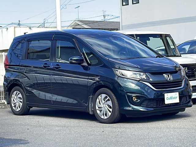 ホンダ フリード＋ G ホンダセンシング 愛媛県 2019(平31)年 7.7万km フォレストグリーンパール 純正ナビ　【VXM-184VFi】/　(フルセグTV　Bluetooth  CD　DVD)　/バックカメラ/ETC　/ドライブレコーダー　/ホンダセンシング　/●衝突軽減ブレーキ〈CMBS〉/●誤発進抑制機能/●ACC〈アダプティブ・クルーズ・コントロール〉/●LKAS〈車線維持支援システム〉/●歩行者事故低減ステアリング/●路外逸脱抑制機能/●先行車発進お知らせ機能/●標識認識機能/ステアリングスイッチ/両側パワースライドドア　/ＬＥＤヘッドライト　/レーンキープアシスト/純正フロアマット/スマートキー/スペアキー/プッシュスタート
