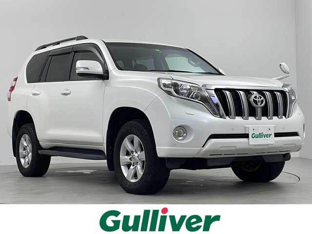 トヨタ ランドクルーザー プラド TX 鹿児島県 2015(平27)年 7.9万km ホワイトパールクリスタルシャイン 純正SDナビ/（フルセグ/Bluetooth/SD/CD/DVD）/ドライブレコーダー/バックカメラ/純正１７インチAW/ルーフレール/ETC/4WD/電動格納ミラー/スマートキー/プッシュスタート/ウィンカーミラー　/フォグライト/ヘッドライトウォッシャー/シートリフター/純正ドアバイザー/ISOFIX/取扱説明書/保証書