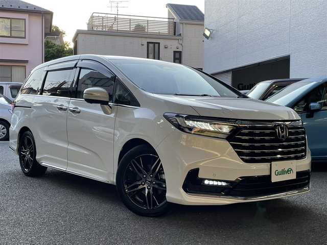 ホンダ オデッセイ ハイブリッド e:HEVアブソルート EX 神奈川県 2024(令6)年 0.4万km プラチナホワイトパール ワンオーナー/純正メモリナビ/フルセグテレビ/バックカメラ/全方位カメラ/ビルトインETC/純正フリップダウンモニター/両側パワースライドドア/パワーバックドア/クルーズコントロール/衝突軽減ブレーキ/車線逸脱警報/プッシュスタート/スペアキー×1本/保証書あり/取扱説明書あり