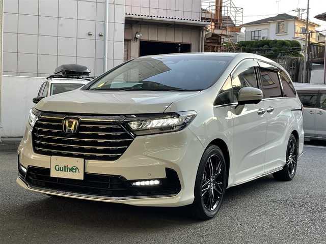ホンダ オデッセイ ハイブリッド e:HEVアブソルート EX 神奈川県 2024(令6)年 0.4万km プラチナホワイトパール ワンオーナー/純正メモリナビ/フルセグテレビ/バックカメラ/全方位カメラ/ビルトインETC/純正フリップダウンモニター/両側パワースライドドア/パワーバックドア/クルーズコントロール/衝突軽減ブレーキ/車線逸脱警報/プッシュスタート/スペアキー×1本/保証書あり/取扱説明書あり