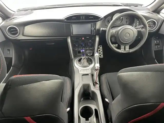 トヨタ ８６ GT 福島県 2012(平24)年 14.2万km サテンホワイトパール 純正メモリナビ  型式:NSZT-W62G/  【CD/DVD/フルセグ/Bluetooth/AM/FM】/・バックカメラ/TRDフルエアロ/・TRD18インチAW/・TRD4本出しマフラー/・TRD車高調/STiフロントタワーバー/Pivot水温計/パドルシフト/スマートキー/360°ドライブレコーダー/横滑り防止機能/HIDヘッドライト/・オートライト/電動格納ミラー/純正フロアマット