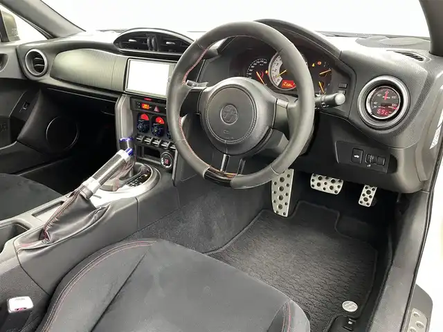 トヨタ ８６ GT 福島県 2012(平24)年 14.2万km サテンホワイトパール 純正メモリナビ  型式:NSZT-W62G/  【CD/DVD/フルセグ/Bluetooth/AM/FM】/・バックカメラ/TRDフルエアロ/・TRD18インチAW/・TRD4本出しマフラー/・TRD車高調/STiフロントタワーバー/Pivot水温計/パドルシフト/スマートキー/360°ドライブレコーダー/横滑り防止機能/HIDヘッドライト/・オートライト/電動格納ミラー/純正フロアマット