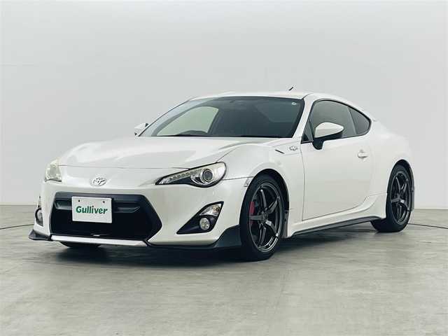 トヨタ ８６ GT 福島県 2012(平24)年 14.2万km サテンホワイトパール 純正メモリナビ  型式:NSZT-W62G/  【CD/DVD/フルセグ/Bluetooth/AM/FM】/・バックカメラ/TRDフルエアロ/・TRD18インチAW/・TRD4本出しマフラー/・TRD車高調/STiフロントタワーバー/Pivot水温計/パドルシフト/スマートキー/360°ドライブレコーダー/横滑り防止機能/HIDヘッドライト/・オートライト/電動格納ミラー/純正フロアマット