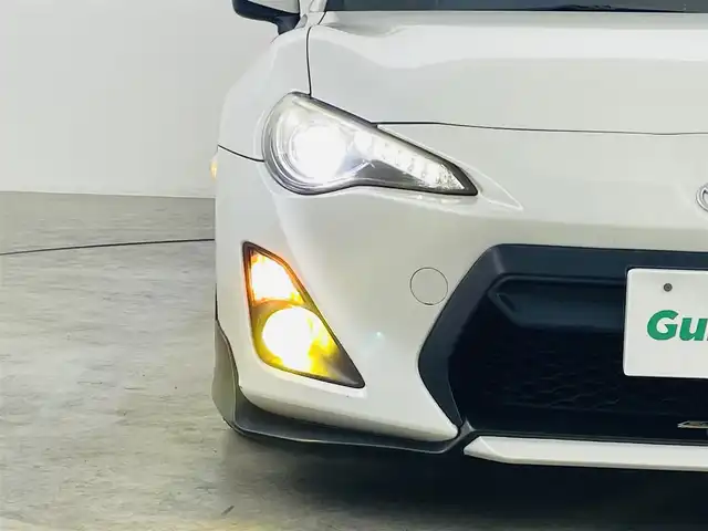 トヨタ ８６ GT 福島県 2012(平24)年 14.2万km サテンホワイトパール 純正メモリナビ  型式:NSZT-W62G/  【CD/DVD/フルセグ/Bluetooth/AM/FM】/・バックカメラ/TRDフルエアロ/・TRD18インチAW/・TRD4本出しマフラー/・TRD車高調/STiフロントタワーバー/Pivot水温計/パドルシフト/スマートキー/360°ドライブレコーダー/横滑り防止機能/HIDヘッドライト/・オートライト/電動格納ミラー/純正フロアマット