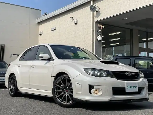 スバル インプレッサ ＷＲＸ STi 和歌山県 2012(平24)年 13.5万km サテンホワイトパール 4WD/6MT/STi専用レカロシート/STiエアロ/FUJITSUBOマフラー/社外メモリナビ/　【フルセグTV/CD/DVD/SD/USB/BT】/ドライブレコーダー/ETC/純正18インチAW/キセノンヘッドライト/フォグランプ/ウィンカーミラー/純正フロアマット