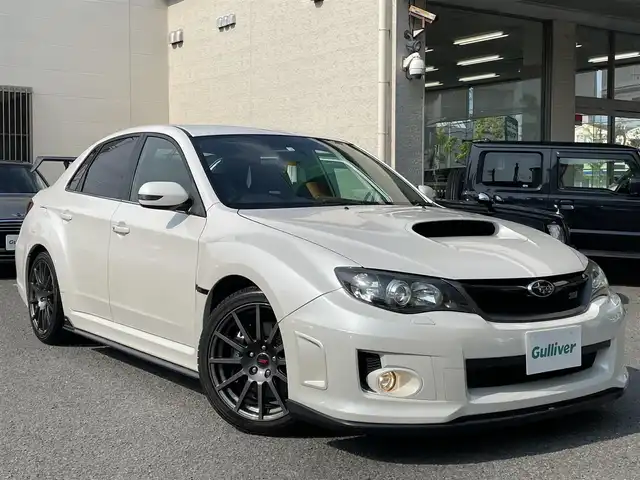 スバル インプレッサ ＷＲＸ STi 和歌山県 2012(平24)年 13.5万km サテンホワイトパール 4WD/6MT/STi専用レカロシート/STiエアロ/FUJITSUBOマフラー/社外メモリナビ/　【フルセグTV/CD/DVD/SD/USB/BT】/ドライブレコーダー/ETC/純正18インチAW/キセノンヘッドライト/フォグランプ/ウィンカーミラー/純正フロアマット