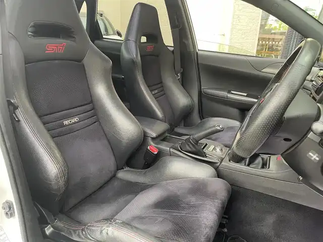 スバル インプレッサ ＷＲＸ STi 和歌山県 2012(平24)年 13.5万km サテンホワイトパール 4WD/6MT/STi専用レカロシート/STiエアロ/FUJITSUBOマフラー/社外メモリナビ/　【フルセグTV/CD/DVD/SD/USB/BT】/ドライブレコーダー/ETC/純正18インチAW/キセノンヘッドライト/フォグランプ/ウィンカーミラー/純正フロアマット