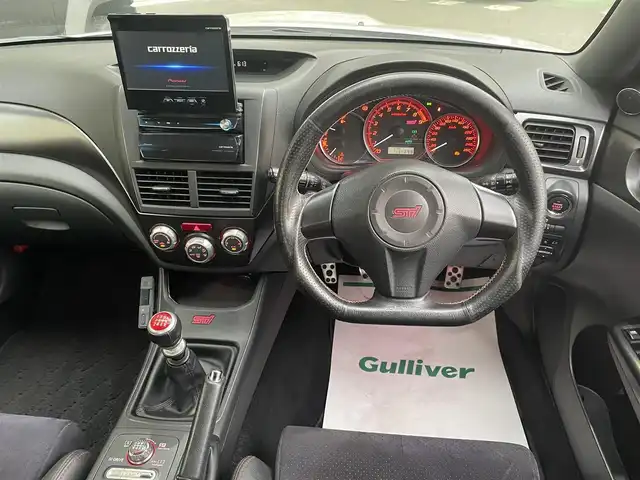 スバル インプレッサ ＷＲＸ STi 和歌山県 2012(平24)年 13.5万km サテンホワイトパール 4WD/6MT/STi専用レカロシート/STiエアロ/FUJITSUBOマフラー/社外メモリナビ/　【フルセグTV/CD/DVD/SD/USB/BT】/ドライブレコーダー/ETC/純正18インチAW/キセノンヘッドライト/フォグランプ/ウィンカーミラー/純正フロアマット