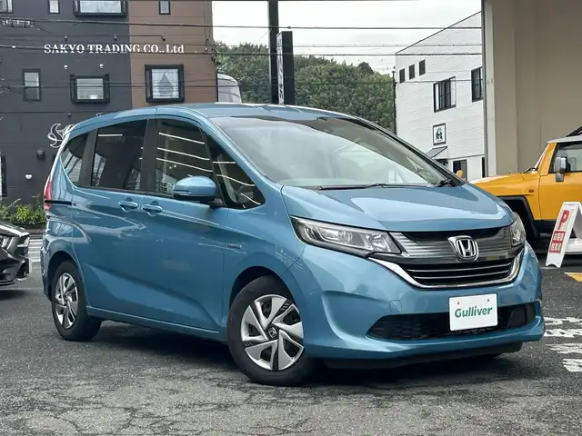 ホンダ フリード ハイブリット G ホンダセンシング 静岡県 2019(平31)年 3.9万km ブルーホライゾンM ワンオーナー/純正ナビ/フルセグTV/DVD/CD/SD/MSV/BT/バックカメラ/両側パワースライドドア/衝突軽減ブレーキ/レーンキープアシスト/レーダークルーズコントロール/前後ドライブレコーダー/ステアリングスイッチ/ビルトインETC/LEDヘッドライト/スマートキー×2/保証書/取扱説明書/ナビ取扱説明書
