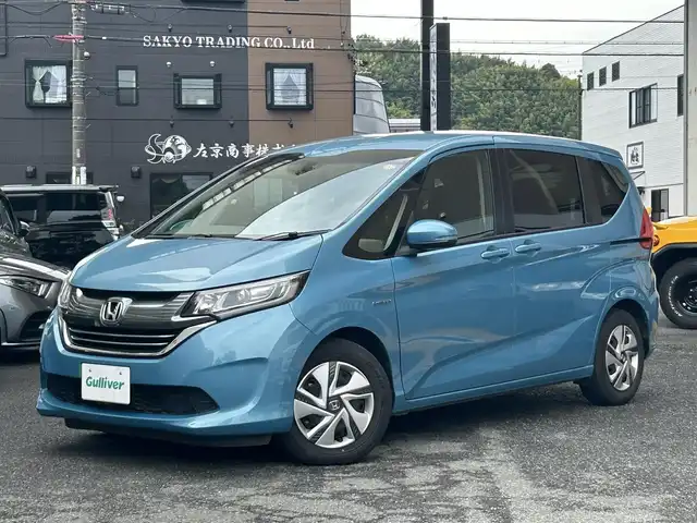 ホンダ フリード ハイブリット G ホンダセンシング 静岡県 2019(平31)年 3.9万km ブルーホライゾンM ワンオーナー/純正ナビ/フルセグTV/DVD/CD/SD/MSV/BT/バックカメラ/両側パワースライドドア/衝突軽減ブレーキ/レーンキープアシスト/レーダークルーズコントロール/前後ドライブレコーダー/ステアリングスイッチ/ビルトインETC/LEDヘッドライト/スマートキー×2/保証書/取扱説明書/ナビ取扱説明書